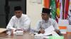 Ketua Bawaslu Kabupaten Bintan Sabrima Putra (kiri) dan Anggota Bawaslu Iskandar menghadiri Rakor Sinkronisasi Data Pemilih PDPB Triwulan III di Kantor KPU Kabupaten Bintan, Kamis (24/9/2026)/Foto:Pemberitaan Bawaslu Bintan